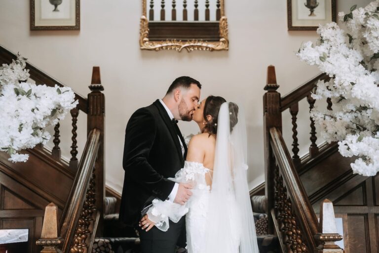 bride & groom kissing at inglewood manor house