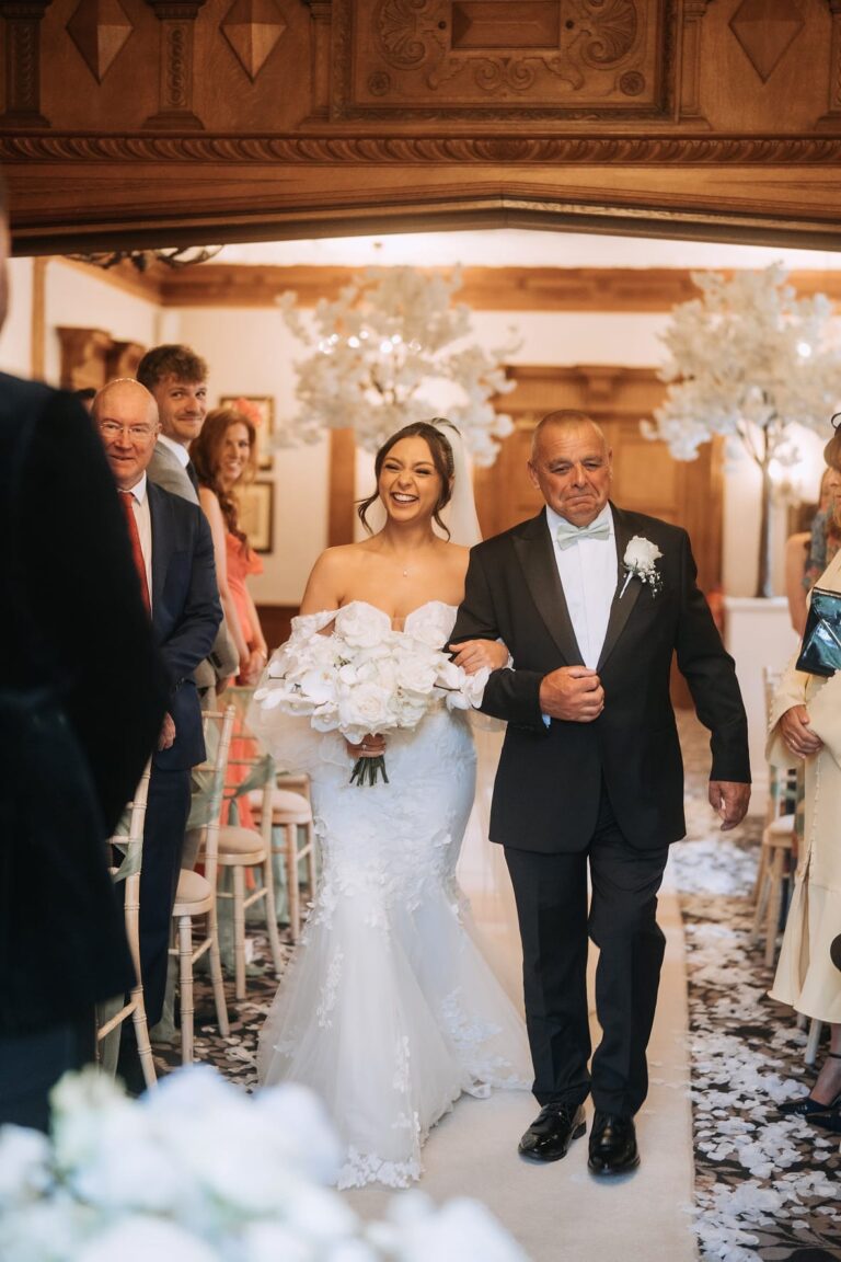 Devon walking down the aisle at Inglewood Manor House Wedding Venue
